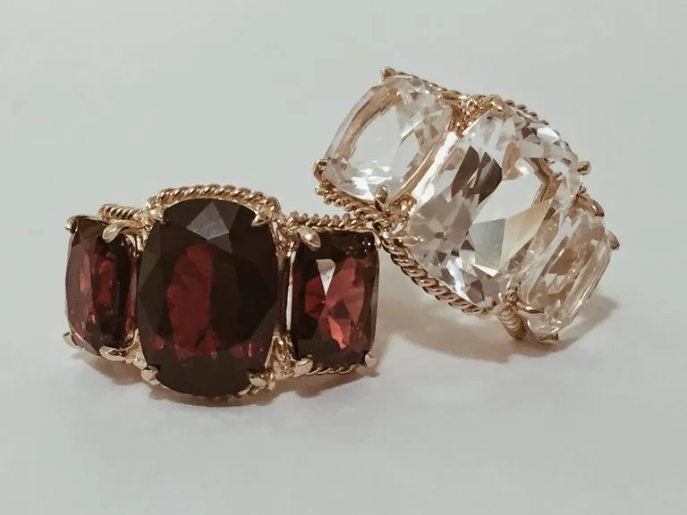 18kt Yellow Gold Three Stone Ring with Pink Topaz and Blue Topaz and Rope Twist Border