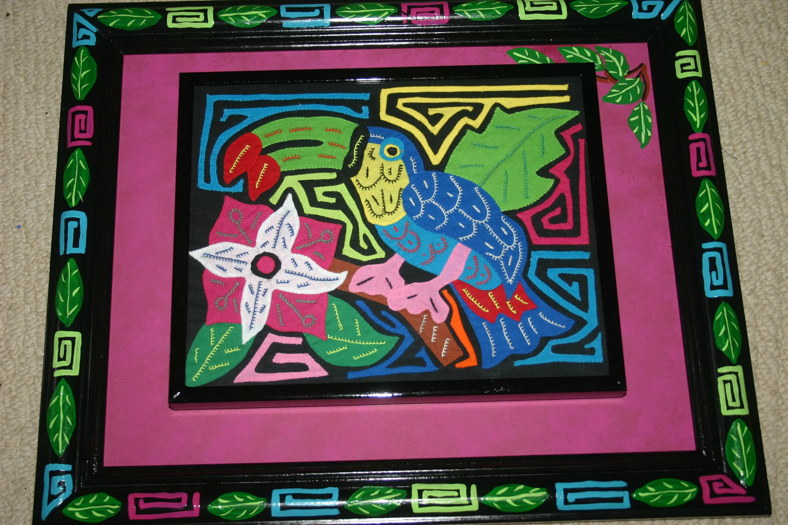 A Kuna Indian Folk Art Mola from San Blas Islands, Panama in Custom Frame, Under Glass & Double Mats. Hand Stitched Applique: Colorful Butterfly  17" X 14" (DFM1) WALL DECOR