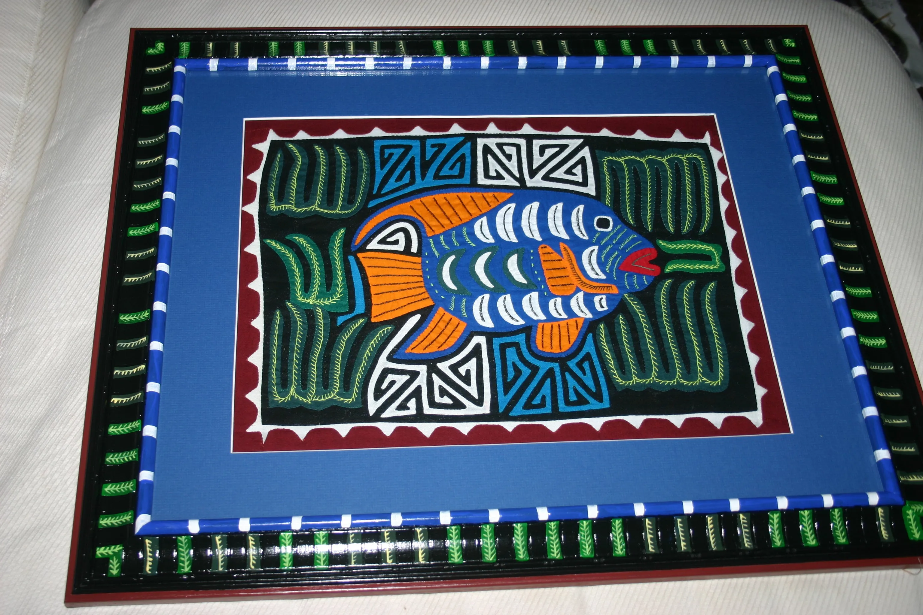 A Kuna Indian Folk Art Mola from San Blas Islands, Panama in Custom Frame, Under Glass & Double Mats. Hand Stitched Applique: Colorful Butterfly  17" X 14" (DFM1) WALL DECOR