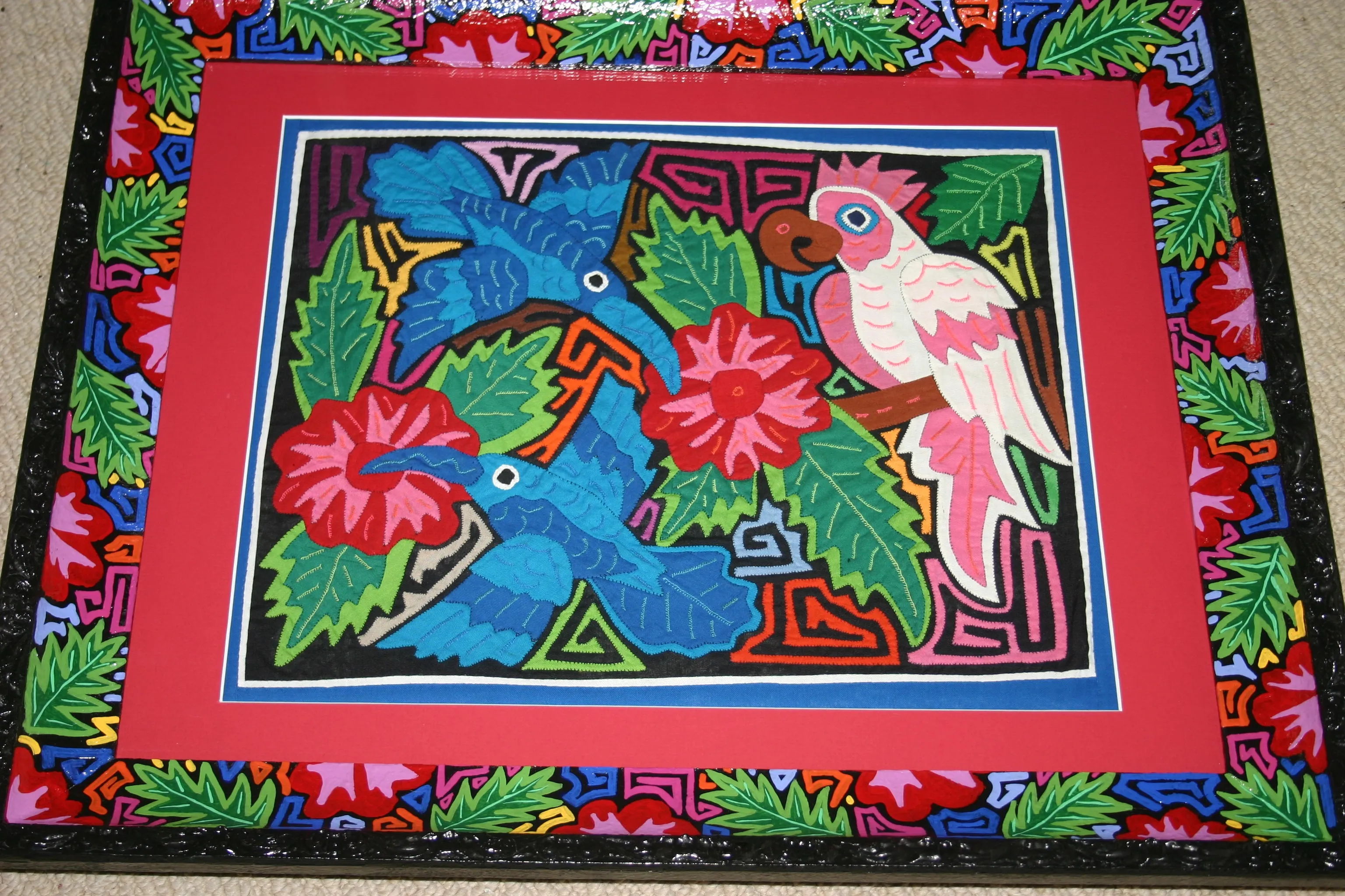 A Kuna Indian Folk Art Mola from San Blas Islands, Panama in Custom Frame, Under Glass & Double Mats. Hand Stitched Applique: Colorful Butterfly  17" X 14" (DFM1) WALL DECOR