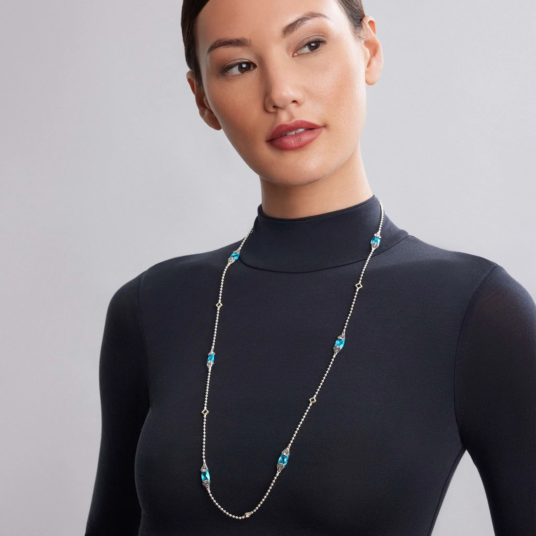 Caviar Color Six Station Swiss Blue Topaz Necklace