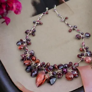 Enchanted Vine Garnet Necklace: A Symbol of Vitality and Elegance
