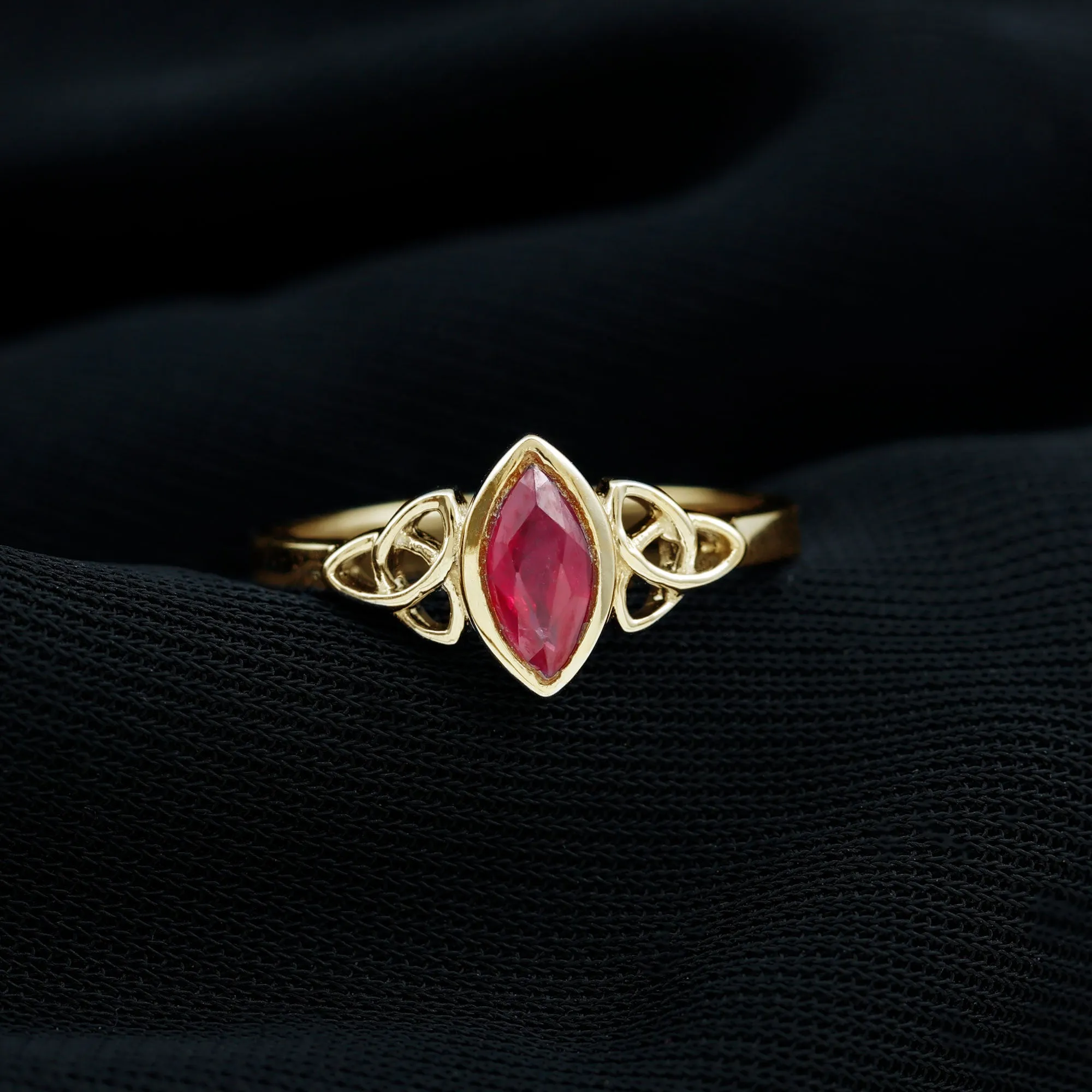 Marquise Shape Ruby Solitaire Celtic Knot Ring