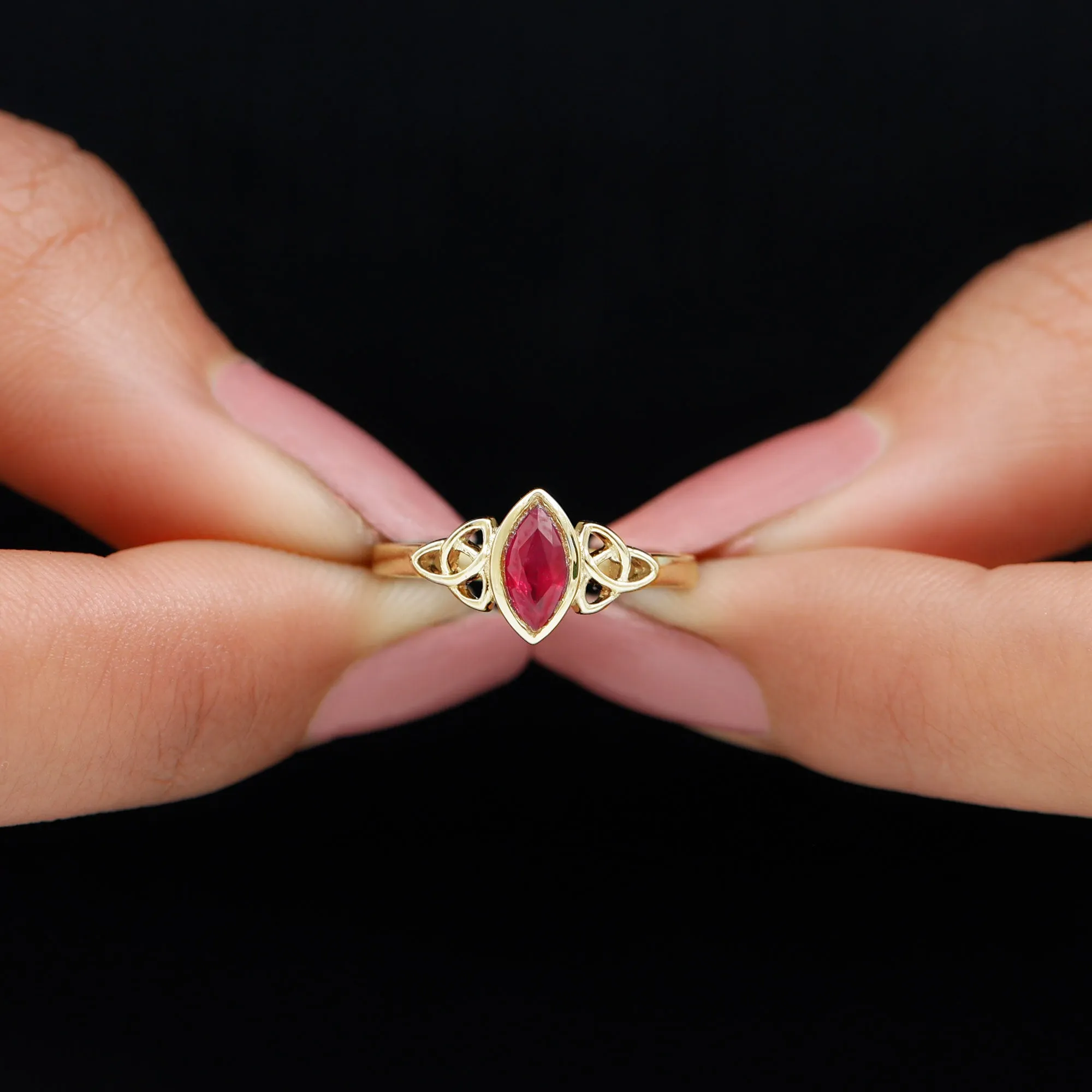 Marquise Shape Ruby Solitaire Celtic Knot Ring