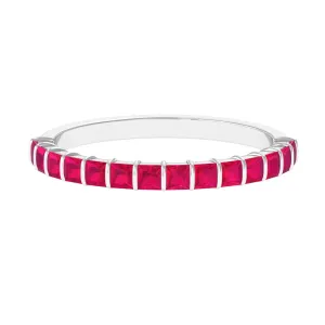 Princess Cut Ruby Semi Eternity Ring in Bar Setting